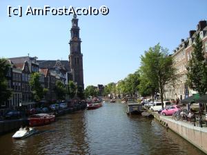 [P02] Canalul Prinsegracht poarta numele printului de Orania si e cel mai lung... turnul de la Westekerk vegheaza ca un bunic canalul de la 1631.  » foto by mireille
 - 
<span class="allrVoted glyphicon glyphicon-heart hidden" id="av944662"></span>
<a class="m-l-10 hidden" id="sv944662" onclick="voting_Foto_DelVot(,944662,1639)" role="button">șterge vot <span class="glyphicon glyphicon-remove"></span></a>
<a id="v9944662" class=" c-red"  onclick="voting_Foto_SetVot(944662)" role="button"><span class="glyphicon glyphicon-heart-empty"></span> <b>LIKE</b> = Votează poza</a> <img class="hidden"  id="f944662W9" src="/imagini/loader.gif" border="0" /><span class="AjErrMes hidden" id="e944662ErM"></span>