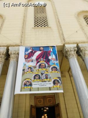 [P10] Catedrala ortodoxa copta din Alexandria, posterul cu pozele victimelor celui mai recent atentat, cel din 9 aprilie 2017 (in poster sunt doar 7, dar in total in urma atentatului care a avut loc aici au murit 18 oameni - inclusiv cei 3 politisti care pazeau intrarea si care erau de religie musulmana) » foto by calator65
 - 
<span class="allrVoted glyphicon glyphicon-heart hidden" id="av856324"></span>
<a class="m-l-10 hidden" id="sv856324" onclick="voting_Foto_DelVot(,856324,2711)" role="button">șterge vot <span class="glyphicon glyphicon-remove"></span></a>
<a id="v9856324" class=" c-red"  onclick="voting_Foto_SetVot(856324)" role="button"><span class="glyphicon glyphicon-heart-empty"></span> <b>LIKE</b> = Votează poza</a> <img class="hidden"  id="f856324W9" src="/imagini/loader.gif" border="0" /><span class="AjErrMes hidden" id="e856324ErM"></span>