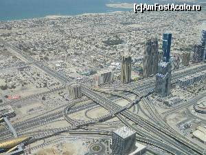 [P12] Nod rutier vazut din Burj Khalifa; in coltul din stanga jos se vede o statie de metrou (aceea cu auriu)  » foto by Maria V.
 - 
<span class="allrVoted glyphicon glyphicon-heart hidden" id="av506935"></span>
<a class="m-l-10 hidden" id="sv506935" onclick="voting_Foto_DelVot(,506935,3199)" role="button">șterge vot <span class="glyphicon glyphicon-remove"></span></a>
<a id="v9506935" class=" c-red"  onclick="voting_Foto_SetVot(506935)" role="button"><span class="glyphicon glyphicon-heart-empty"></span> <b>LIKE</b> = Votează poza</a> <img class="hidden"  id="f506935W9" src="/imagini/loader.gif" border="0" /><span class="AjErrMes hidden" id="e506935ErM"></span>