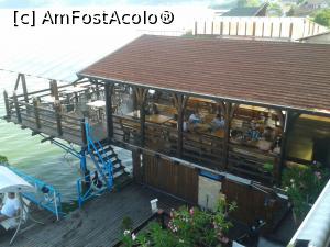 [P05] terasa restaurantului. Sub placile de policarbonat se simte efectul de sera. Mai bine e sub acoperisul cu invelitoare » foto by spiros
 - 
<span class="allrVoted glyphicon glyphicon-heart hidden" id="av767459"></span>
<a class="m-l-10 hidden" id="sv767459" onclick="voting_Foto_DelVot(,767459,5730)" role="button">șterge vot <span class="glyphicon glyphicon-remove"></span></a>
<a id="v9767459" class=" c-red"  onclick="voting_Foto_SetVot(767459)" role="button"><span class="glyphicon glyphicon-heart-empty"></span> <b>LIKE</b> = Votează poza</a> <img class="hidden"  id="f767459W9" src="/imagini/loader.gif" border="0" /><span class="AjErrMes hidden" id="e767459ErM"></span>