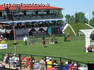 [P13] Spruce Meedows- International Ring - Cupa Nord America - proba de cross country (pe fundal tribuna VIP)  » foto by ebirsan
 - 
<span class="allrVoted glyphicon glyphicon-heart hidden" id="av743464"></span>
<a class="m-l-10 hidden" id="sv743464" onclick="voting_Foto_DelVot(,743464,13751)" role="button">șterge vot <span class="glyphicon glyphicon-remove"></span></a>
<a id="v9743464" class=" c-red"  onclick="voting_Foto_SetVot(743464)" role="button"><span class="glyphicon glyphicon-heart-empty"></span> <b>LIKE</b> = Votează poza</a> <img class="hidden"  id="f743464W9" src="/imagini/loader.gif" border="0" /><span class="AjErrMes hidden" id="e743464ErM"></span>