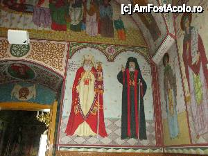 [P38] Mănăstirea Vorona: interior Biserica Nașterea Maicii Domnului cu tablourile în mărime naturală ale patriarhilor BOR, Iustin și Teoctist. Au fost adăugate pe peretele pronaosului cu trei decenii în urmă.  » foto by mariana.olaru
 - 
<span class="allrVoted glyphicon glyphicon-heart hidden" id="av421051"></span>
<a class="m-l-10 hidden" id="sv421051" onclick="voting_Foto_DelVot(,421051,14160)" role="button">șterge vot <span class="glyphicon glyphicon-remove"></span></a>
<a id="v9421051" class=" c-red"  onclick="voting_Foto_SetVot(421051)" role="button"><span class="glyphicon glyphicon-heart-empty"></span> <b>LIKE</b> = Votează poza</a> <img class="hidden"  id="f421051W9" src="/imagini/loader.gif" border="0" /><span class="AjErrMes hidden" id="e421051ErM"></span>